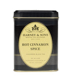 Harney & Sons Hot Cinnamon Spice tea box with vibrant packaging on a neutral background, by Harney & Sons.