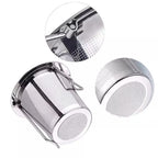 Foldable strainer by Nepal Tea, a compact kitchen tool for draining liquids, shown folded and ready for storage.