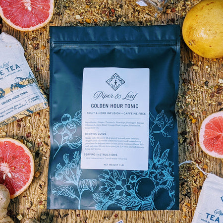 Piper and Leaf Golden Hour Tonic Pound Bag - 190 servings, showcasing loose leaf tea with ginger, turmeric, and grapefruit.