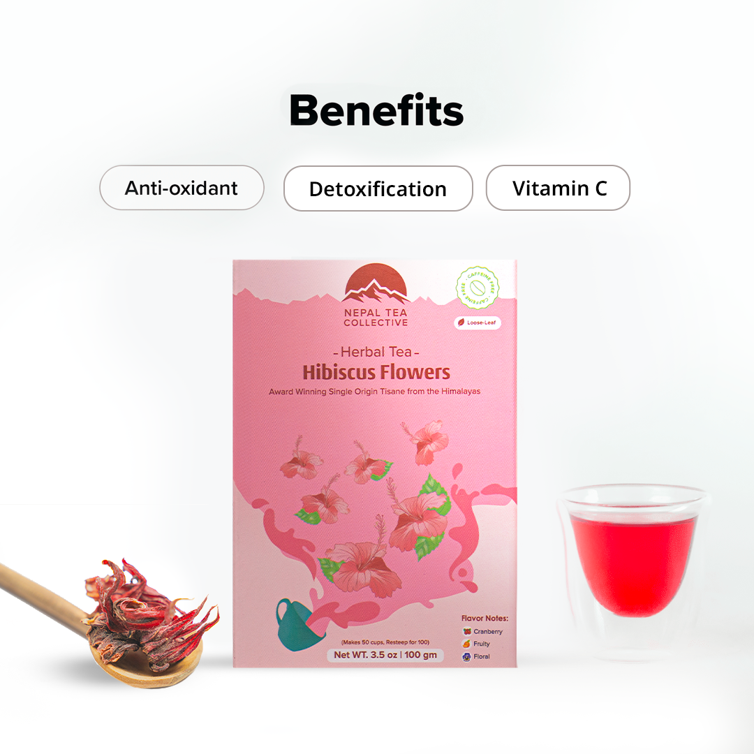 Hibiscus tea from Nepal Tea in a transparent glass, showcasing the deep red color of the brewed beverage.