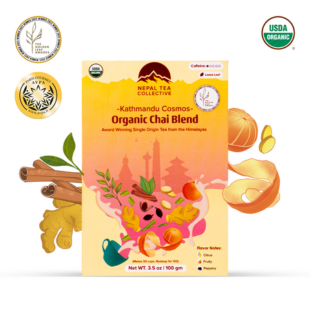 Kathmandu Cosmos black tea blend by Nepal Tea in a packaging featuring golden tips, ginger, and cardamom notes.