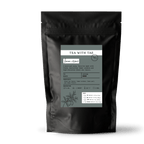 Tea with Tae Lemon Crème Pouch featuring a yellow and white design, ideal for brewing lemon-flavored tea.