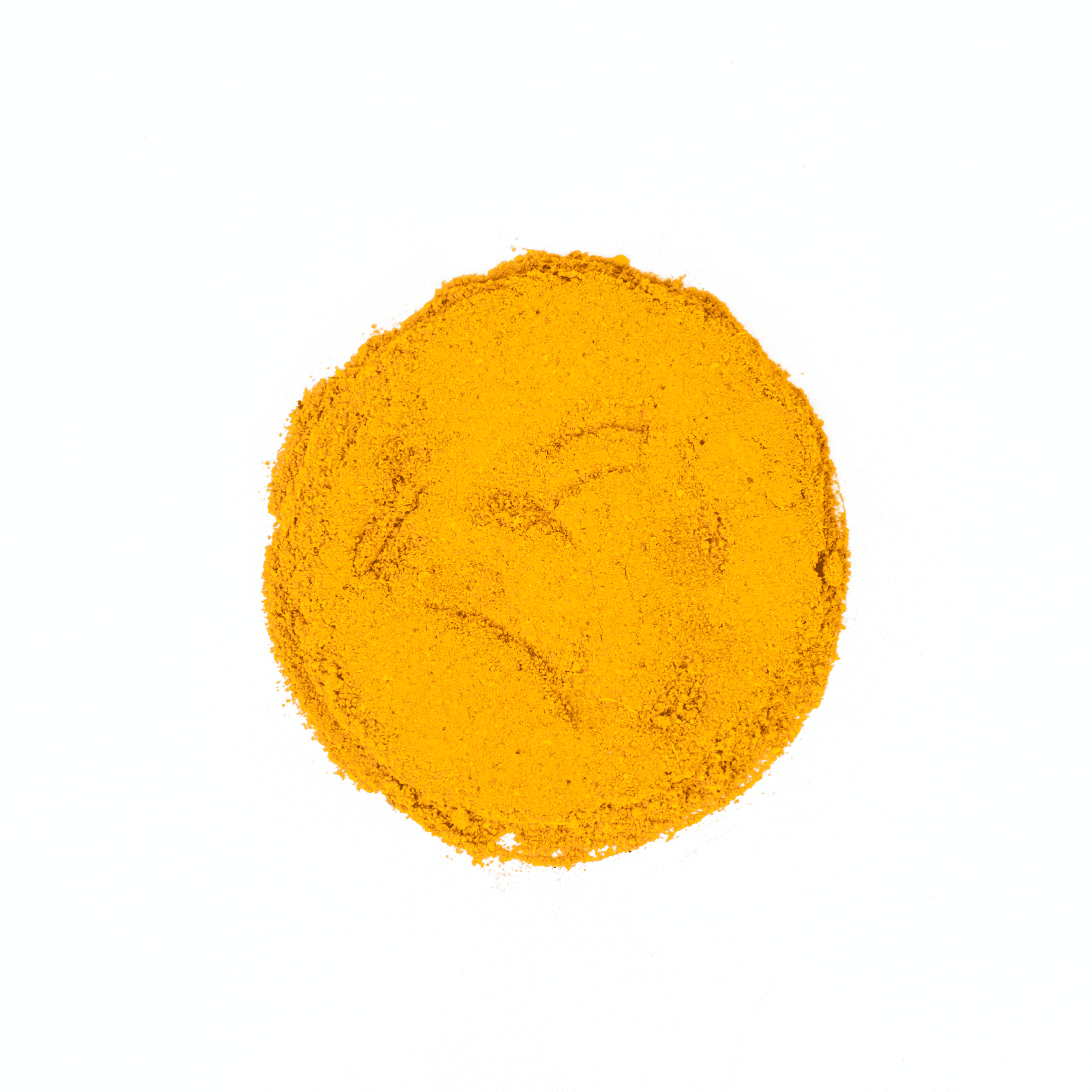 Organic Golden Milk by Nepal Tea in a clear glass jar, showcasing a yellow powder blend with a spoon beside it.