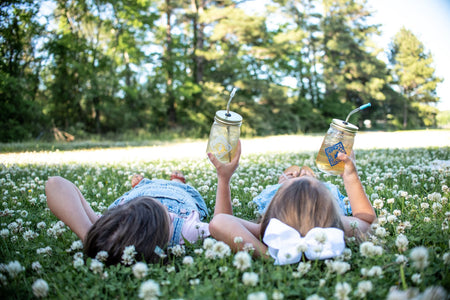 Piper and Leaf Signature Mason Jar - Pint Size, a 16 oz. jar with a straw hole lid for iced tea, crafted in the USA.