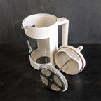 Piper and Leaf Piper Press, metal press pieces for brewing tea, shown in product image