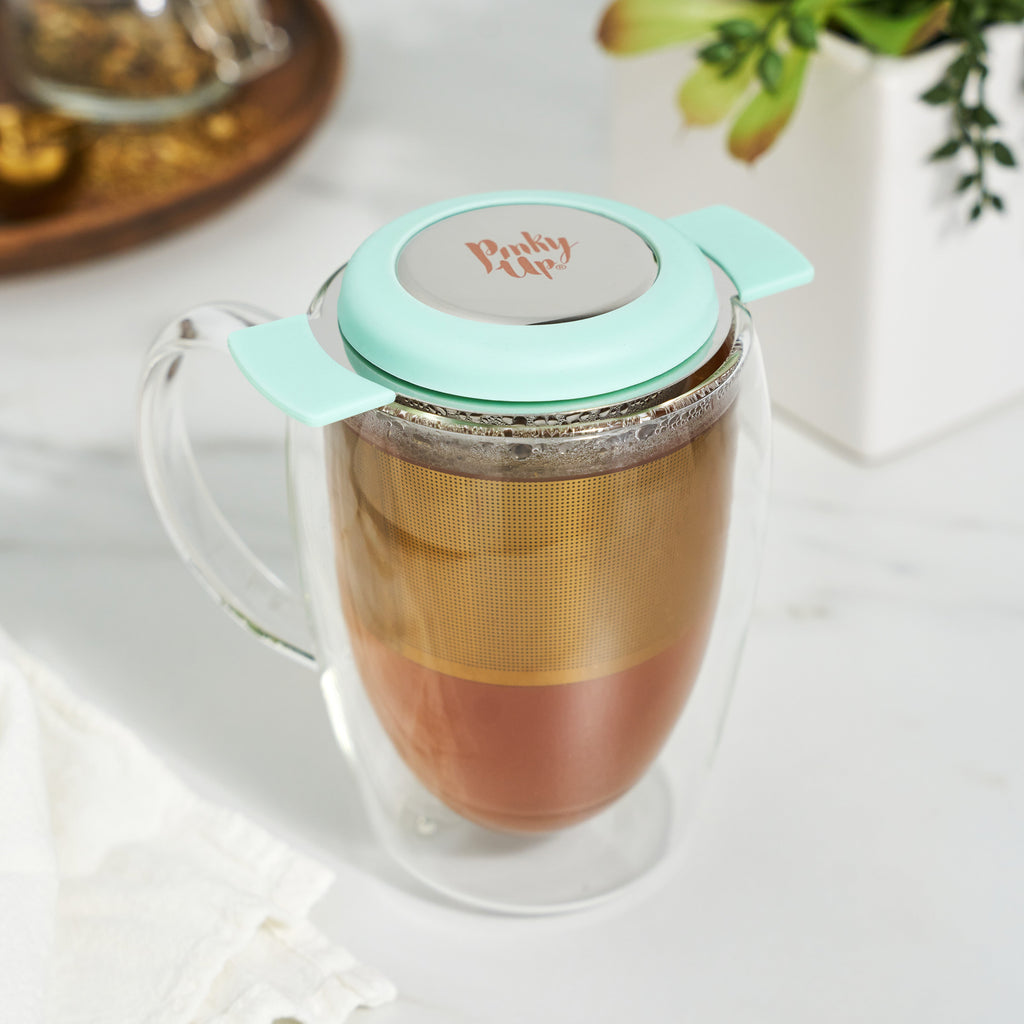 Pinky Up Erin Universal Tea Infuser in Turquoise, a versatile tea infuser designed for brewing loose leaf tea.