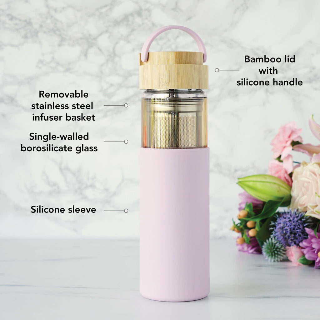 Pinky Up Dana Glass Travel Mug in Lavender featuring a clear glass design and a lavender silicone sleeve for insulation.
