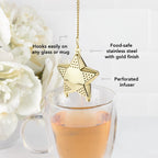 Pinky Up Star Shaped Tea Infuser in pink, designed for brewing loose leaf tea, featuring a unique star shape.