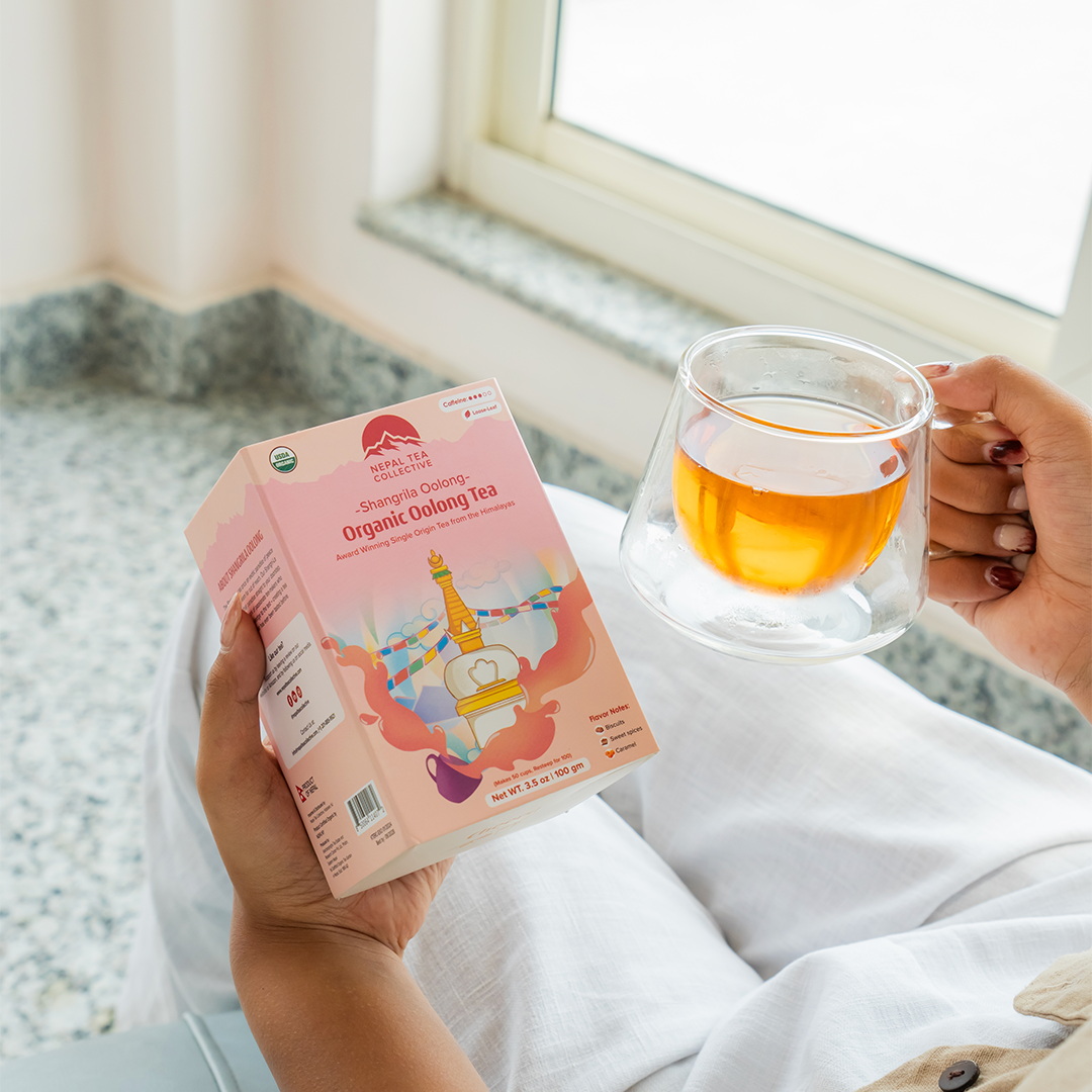 Shangri-La Oolong tea leaves in a loose form, showcased in a clear package by Nepal Tea