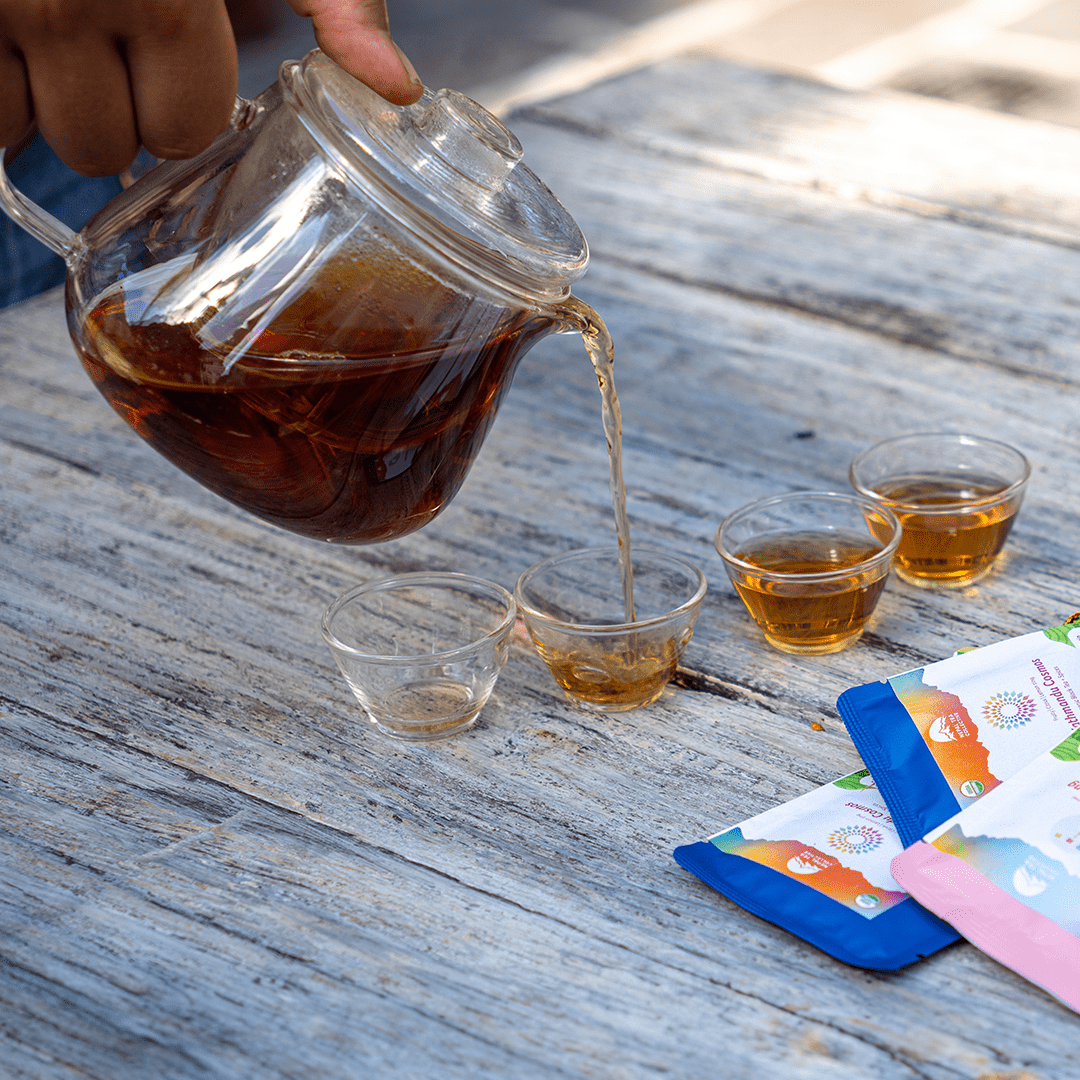 The Tea Explorer Set by Nepal Tea featuring a variety of tea samples and accessories, displayed in a neatly arranged set.