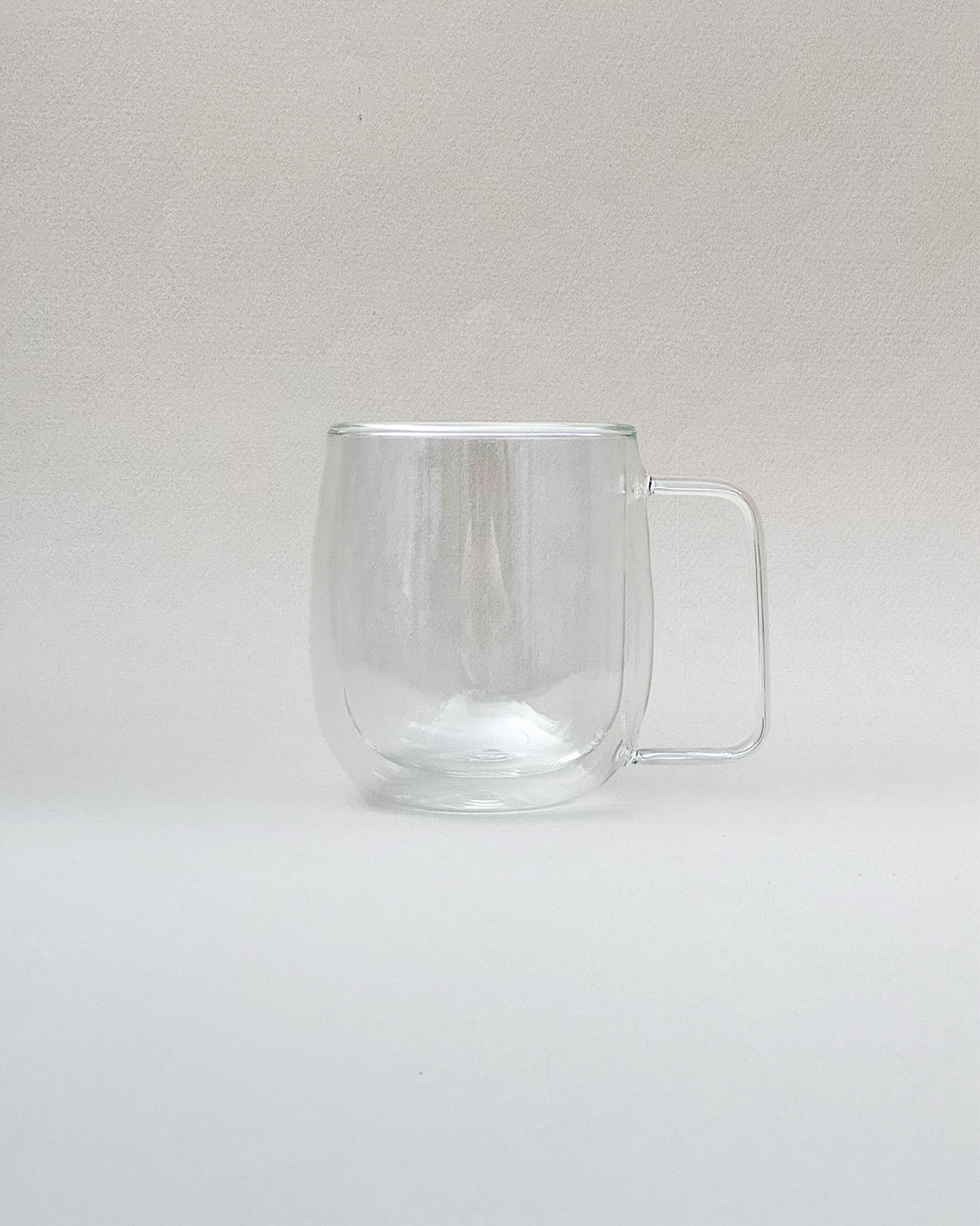 Teappo Simple Teacup, hand-blown double-wall borosilicate glass mug, 300 mL capacity, microwave safe, lightweight design.