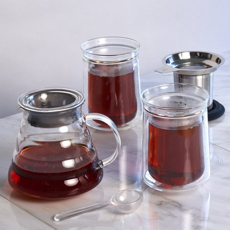 August Tea for Two - The Perfect Starter Tea Set by August, featuring a glass teapot, two tasting glasses, and a cup infuser.