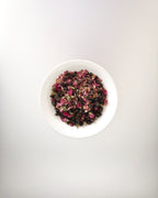 Teappo Rose Oolong tea leaves in a pile, showcasing the product's unique floral blend and vibrant color.