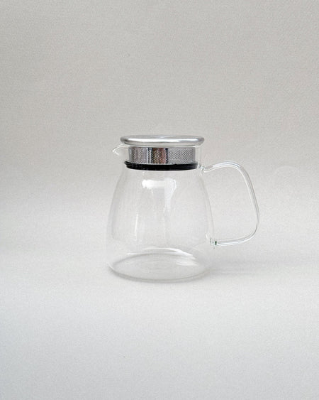 Teappo Simple Teapot, 740 mL glass pot with stainless steel lid, featuring a large arched handle for easy pouring.