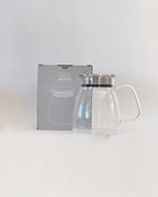 Teappo Simple Teapot by Teappo, showcasing a minimalist design with a smooth finish in an elegant teapot shape.