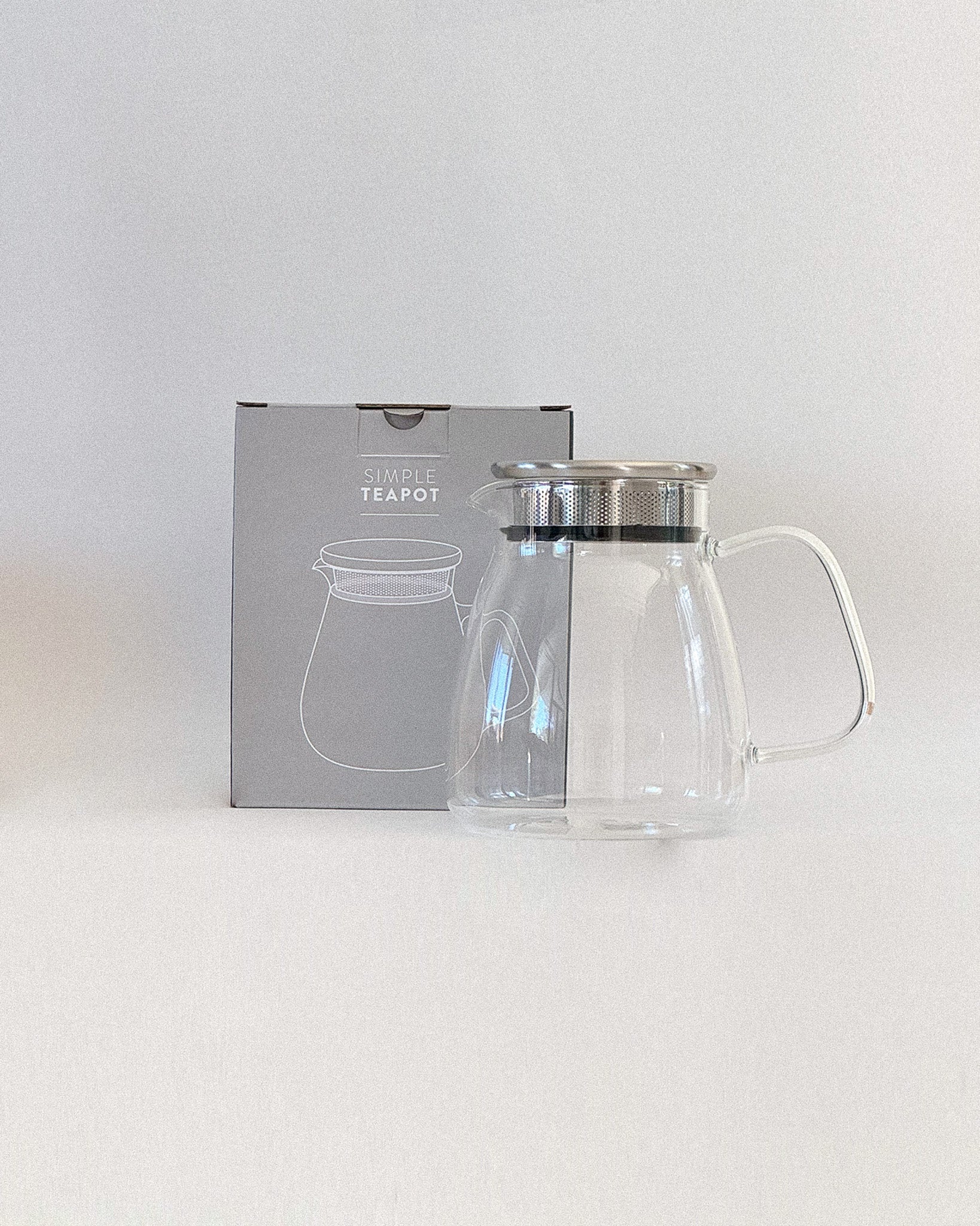Teappo Simple Teapot by Teappo, showcasing a minimalist design with a smooth finish in an elegant teapot shape.