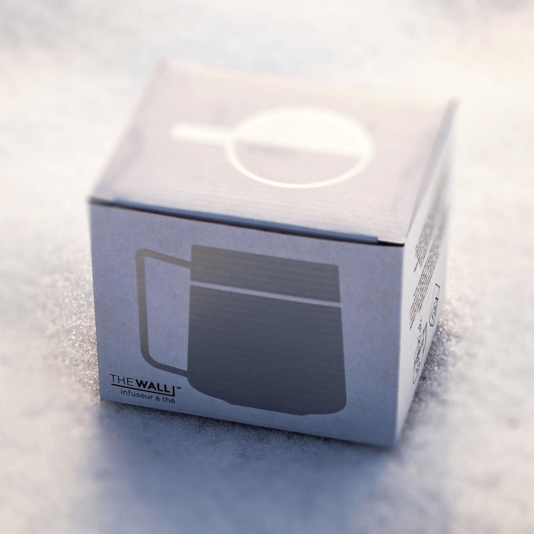 The WALL® Tea Infuser by Nepal Tea, a sleek stainless steel infuser for brewing loose leaf tea, displayed in an image.