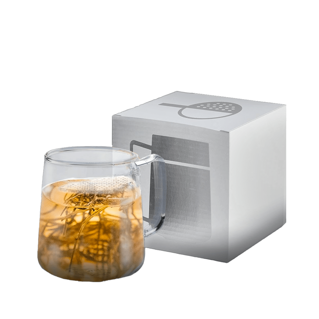 The WALL® Tea Infuser by Nepal Tea, a handmade borosilicate glass teacup with a fused glass strainer for infusing tea.