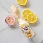 Pinky Up Lemon Sugar in a clear container, featuring a yellow, granular sugar blend for tea and beverage sweetening.