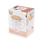 Pinky Up Bailey: Botanical Bliss Ceramic Tea Mug & Infuser featuring a floral design, perfect for brewing tea.