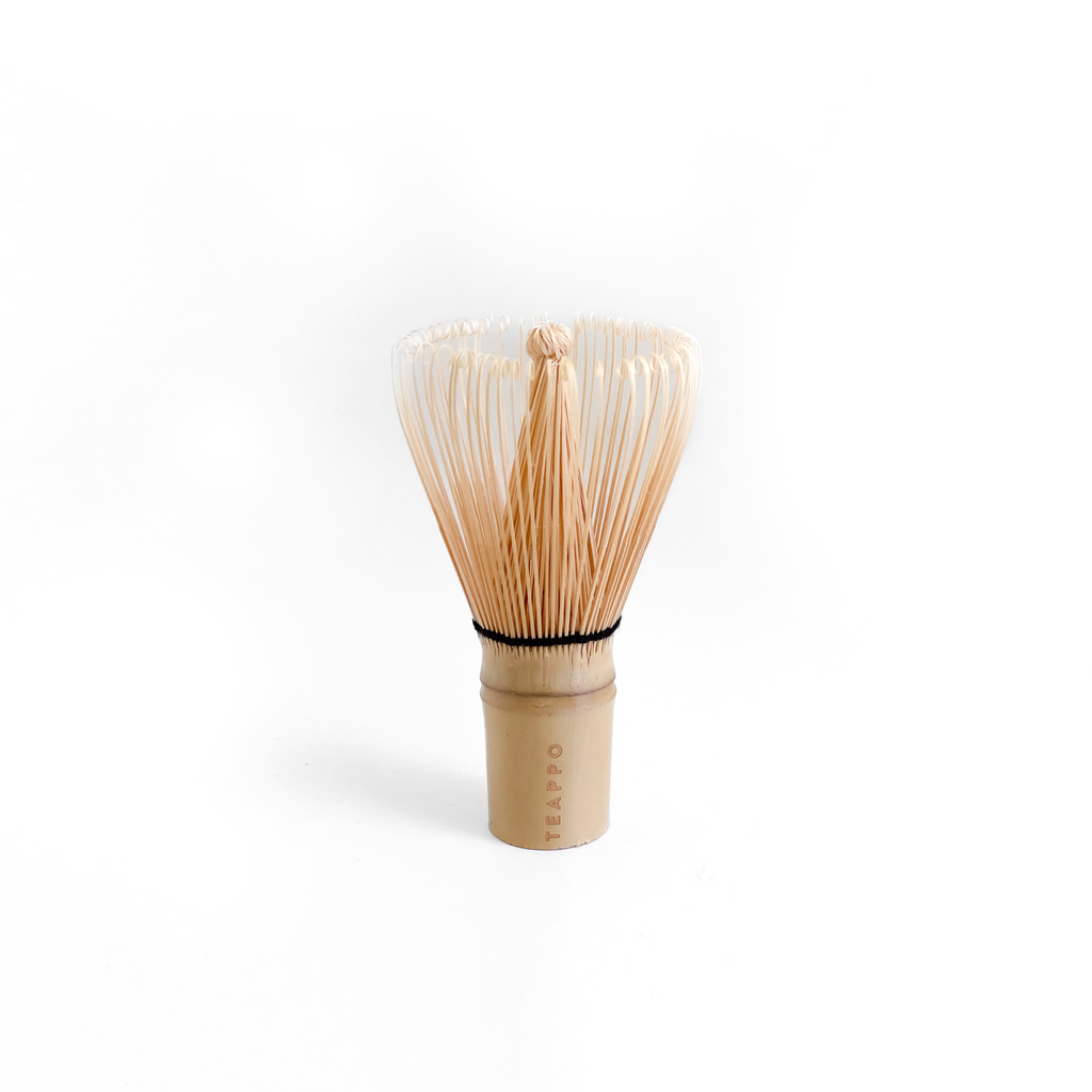 Teappo Premium Matcha Whisk, a handmade bamboo whisk with 100 prongs, designed for whisking matcha into a frothy texture.