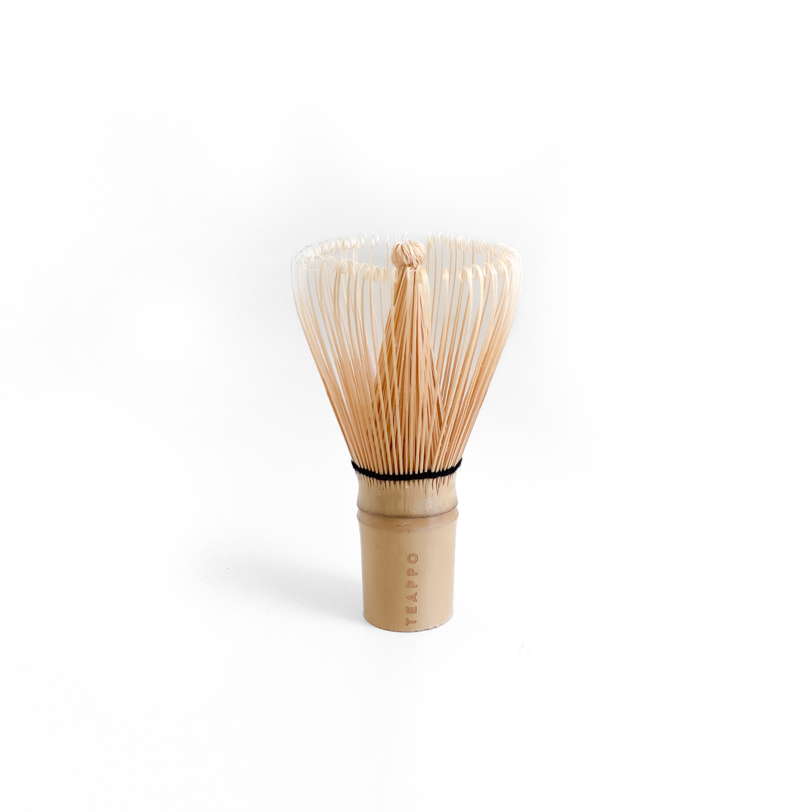 Teappo Premium Matcha Whisk, a handmade bamboo whisk with 100 prongs, designed for whisking matcha into a frothy texture.