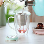 Pinky Up Erin Universal Tea Infuser in Turquoise, a tea infuser designed for loose leaf tea, shown in a vibrant turquoise color.