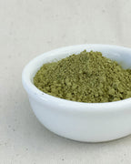 Teappo Yuzu Oolong Powder in a white pouch displayed against a neutral background, featuring the brand name prominently.
