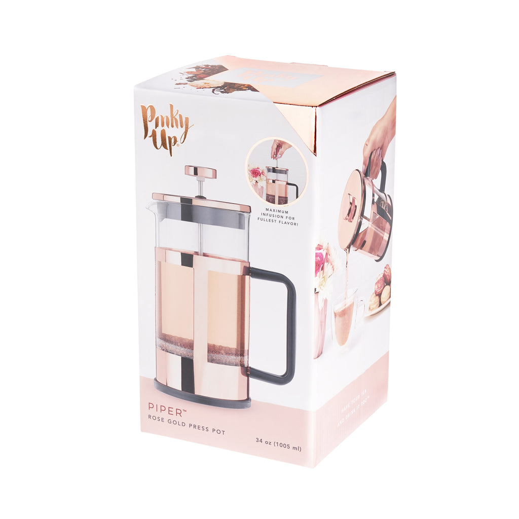 Pinky Up Piper Rose Gold Press Pot, a sleek coffee press with a rose gold finish, perfect for brewing coffee or tea.