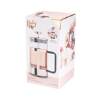 Pinky Up Piper Rose Gold Press Pot, a sleek coffee press with a rose gold finish, perfect for brewing coffee or tea.