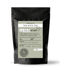 Tea with Tae Yuzu Kukicha Loose Leaf Pouch (3oz. or 1lbs.) showing the loose leaf tea and packaging featuring green tea and yuzu peel.